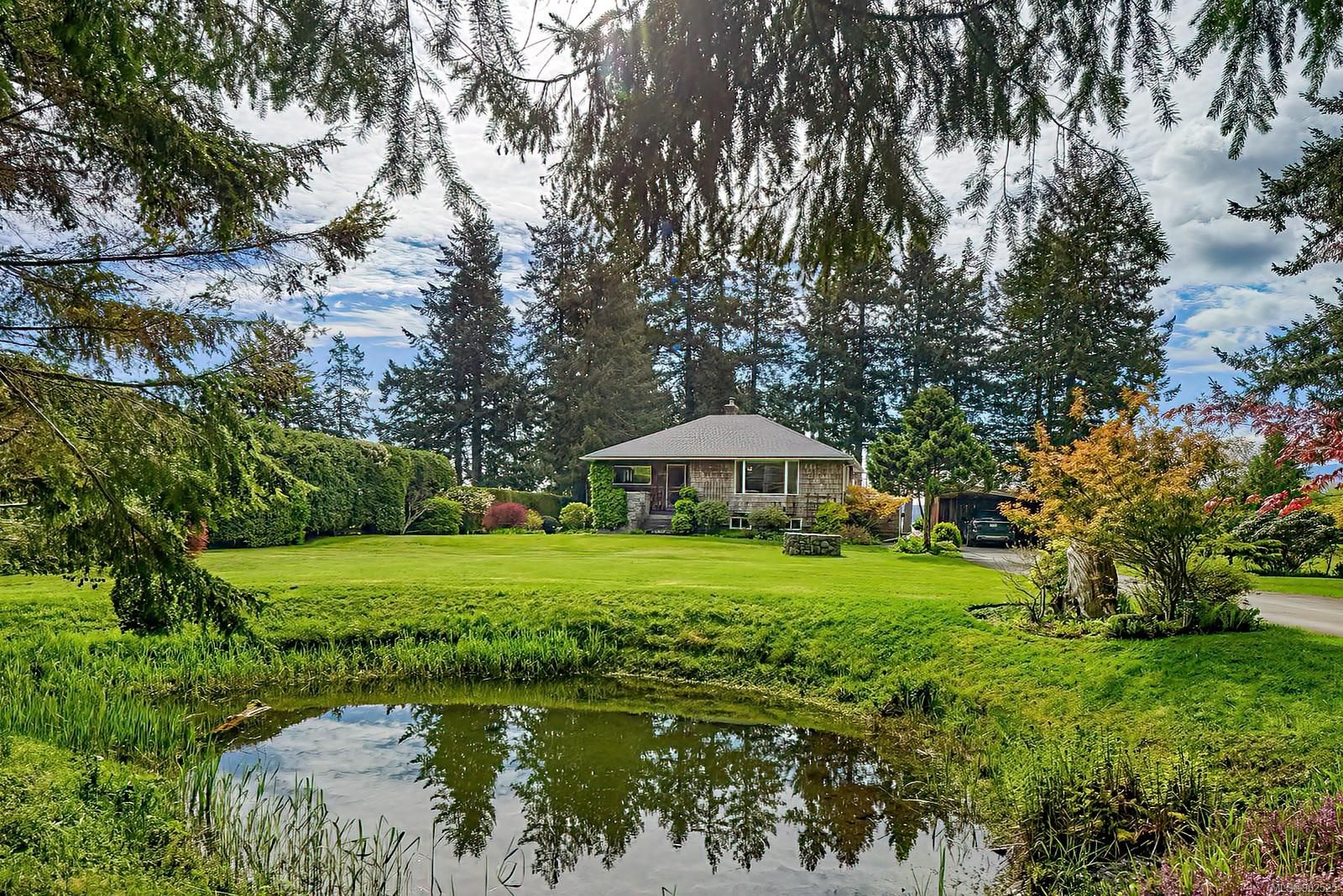 Main Photo: 7979 White Duck Rd in Fanny Bay: CV Union Bay/Fanny Bay House for sale (Comox Valley)  : MLS®# 902525