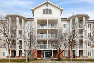 Photo 1: 409 17 Country Village Bay NE in Calgary: Country Hills Village Apartment for sale : MLS®# A2120461
