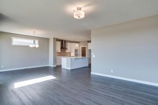 Photo 13: 74 CREEKSIDE Avenue SW in Calgary: C-168 Detached for sale : MLS®# A1020234