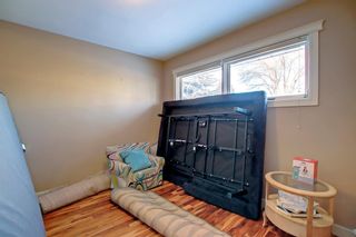 Photo 10: 49 ROSSDALE Road SW in Calgary: Rosscarrock Detached for sale : MLS®# A2014032