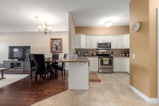 Photo 14: 210 248 Sunterra Ridge Place: Cochrane Apartment for sale : MLS®# A2053195