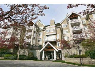 Photo 1: 106 1428 PARKWAY Boulevard in Coquitlam: Westwood Plateau Condo for sale in "MONTREAU" : MLS®# V1097817