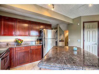 Photo 4: 88 PROMINENCE View SW in CALGARY: Prominence_Patterson Townhouse for sale (Calgary)  : MLS®# C3619992