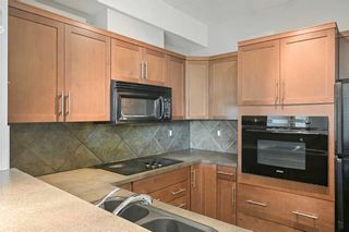 Photo 10: 325 26 Val Gardena View SW in Calgary: Springbank Hill Apartment for sale : MLS®# A2083293