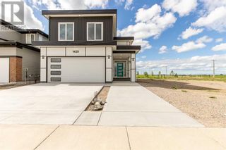 Photo 2: 1420 Halifax Road W in Lethbridge: House for sale : MLS®# A2059922