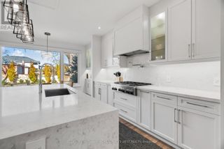 Photo 6: 92 MERVYN AVE in Toronto: House for sale : MLS®# W7310818