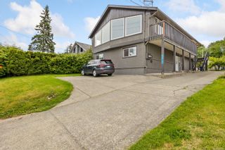 Photo 1: 570 Island Hwy in Campbell River: CR Campbell River Central Full Duplex for sale : MLS®# 899430