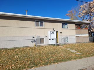 Photo 3: 7403 36 Avenue NW in Calgary: Bowness 4 plex for sale : MLS®# A2023861