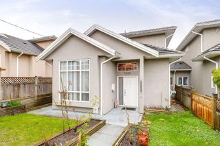 Photo 1: 7330 14TH Avenue in Burnaby: Edmonds BE 1/2 Duplex for sale (Burnaby East)  : MLS®# R2257150