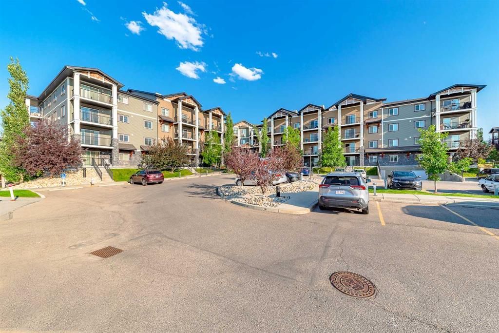 Main Photo: 2202 130 Panatella Street NW in Calgary: Panorama Hills Apartment for sale : MLS®# A2053476