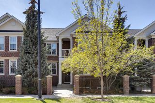 Photo 1: 15 10 St Julien Drive SW in Calgary: Garrison Woods Row/Townhouse for sale : MLS®# A2048516