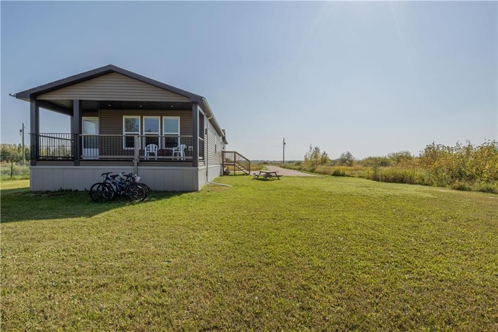 Main Photo: 97 Upstream Crescent in St Malo: R17 Residential for sale : MLS®# 202324424