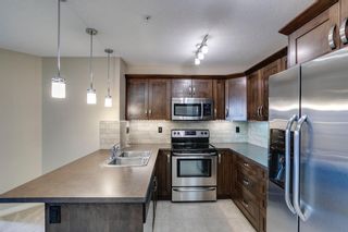 Photo 5: 1204 130 Panatella Street NW in Calgary: Panorama Hills Apartment for sale : MLS®# A2005009