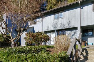 Photo 1: 905 BRITTON Drive in Port Moody: North Shore Pt Moody Townhouse for sale in "WOODSIDE VILLAGE" : MLS®# R2457346