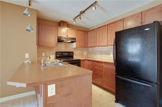 Photo 4: 3203 92 Crystal Shores Road: Okotoks Apartment for sale : MLS®# A2003980