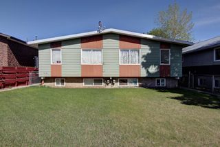 Photo 1: 7610-7612 25 Street SE in Calgary: Ogden Duplex for sale : MLS®# A1140747