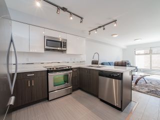 Photo 1: 401 2408 E BROADWAY in Vancouver: Renfrew VE Condo for sale in "BROADWAY CROSSING" (Vancouver East)  : MLS®# R2102626
