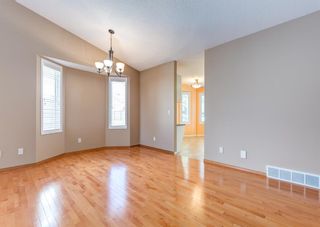 Photo 6: 20 Arbour Cliff Close NW in Calgary: Arbour Lake Semi Detached for sale : MLS®# A1216259