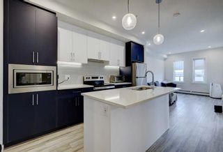 Photo 2: 114 238 Sage Valley Common NW in Calgary: Sage Hill Apartment for sale : MLS®# A2129095