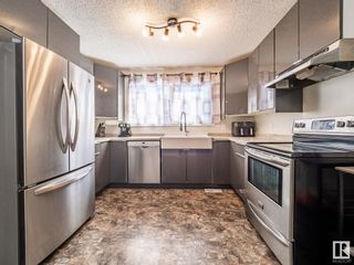 Photo 19: 427 DUNLUCE Road in Edmonton: Zone 27 Townhouse for sale : MLS®# E4320960