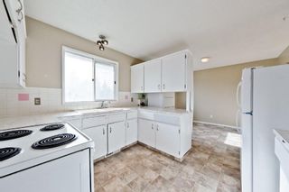 Photo 4: 539 HUNTERPLAIN Hill NW in Calgary: Huntington Hills Detached for sale : MLS®# A1024979