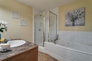 Photo 18: 17 11 Scarpe Drive SW in Calgary: Garrison Woods Row/Townhouse for sale : MLS®# A1103969