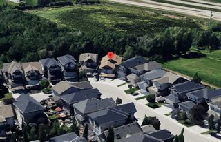 Photo 2: 201 Auburn Glen Manor SE in Calgary: Auburn Bay Detached for sale : MLS®# A2121553