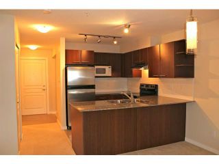 Photo 1: 114 4728 BRENTWOOD Drive in Burnaby: Brentwood Park Condo for sale in "VARLEY" (Burnaby North)  : MLS®# V995826