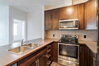 Photo 6: 303 48 Panatella Road NW in Calgary: Panorama Hills Apartment for sale : MLS®# A1231118