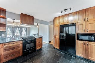 Photo 11: 8011 Silver Springs Road NW in Calgary: Silver Springs Detached for sale : MLS®# A1106791