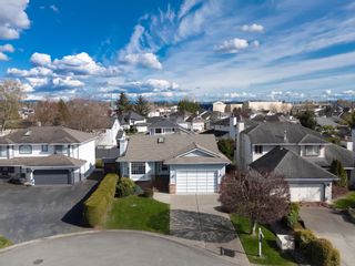 Photo 1: 12228 CYPRESS Court in Pitt Meadows: Mid Meadows House for sale : MLS®# R2869693