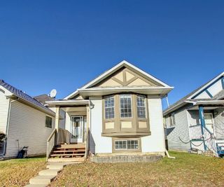 Photo 1: 72 Erin Circle SE in Calgary: Erin Woods Detached for sale : MLS®# A1162049
