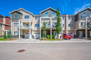 Photo 1: 541 Redstone View NE in Calgary: Redstone Row/Townhouse for sale : MLS®# A1239533