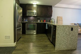 Photo 11: 104 45 Aspenmont Heights SW in Calgary: Aspen Woods Apartment for sale : MLS®# A2014279