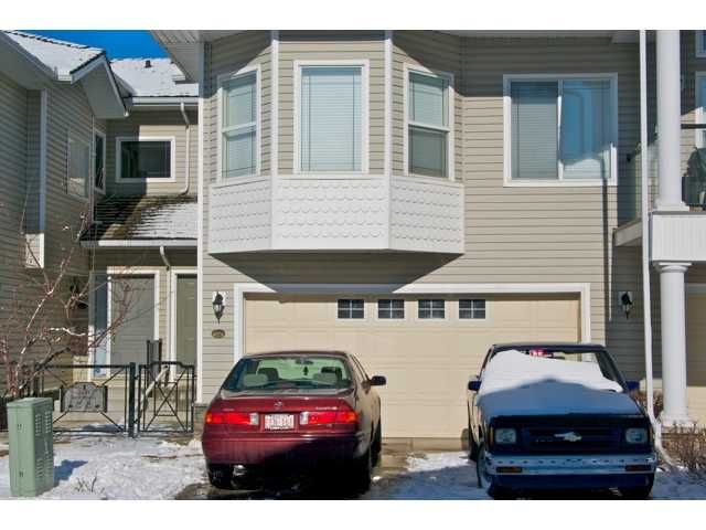 Main Photo: 24 ROCKY VISTA Terrace NW in CALGARY: Rocky Ridge Ranch Residential Attached for sale (Calgary)  : MLS®# C3509199