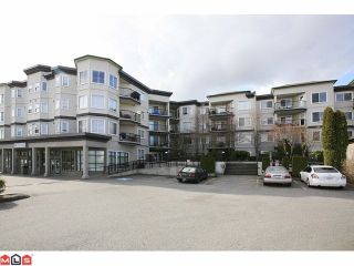Photo 1: 401 5759 GLOVER Road in Langley: Langley City Condo for sale in "College Court" : MLS®# F1207206