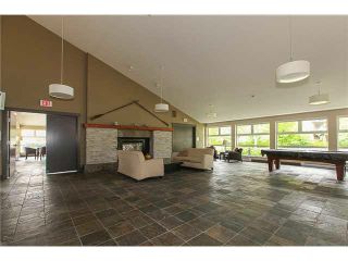 Photo 13: 411 500 KLAHANIE Drive in Port Moody: Port Moody Centre Condo for sale in "TIDES" : MLS®# R2025736