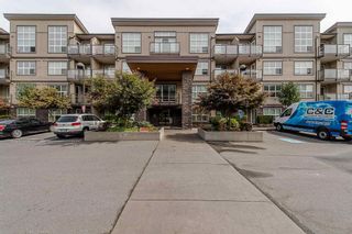 Photo 1: 110 30525 CARDINAL Avenue in Abbotsford: Abbotsford West Condo for sale in "Tamarind Westside" : MLS®# R2594552