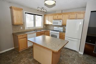 Photo 6: 500 QUEEN CHARLOTTE Road SE in Calgary: Queensland House for sale : MLS®# C4161962