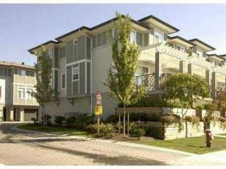 Photo 1: 50 1010 EWEN Avenue in New Westminster: Queensborough Townhouse for sale in "WINDSOR MEWS" : MLS®# V1015419