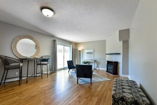 Photo 6: 1301 829 Coach Bluff Crescent in Calgary: Coach Hill Row/Townhouse for sale : MLS®# A1094909