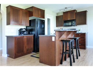 Photo 13: 772 LUXSTONE Landing SW: Airdrie House for sale : MLS®# C4016201
