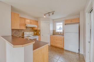 Photo 9: 90 Panamount Drive NW in Calgary: Panorama Hills Row/Townhouse for sale : MLS®# A1207583