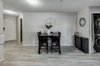 Photo 10: 302 33 Arbour Grove Close NW in Calgary: Arbour Lake Apartment for sale : MLS®# A2024734