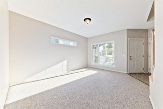 Photo 5: 34 Crestbrook Hill SW in Calgary: Crestmont Detached for sale : MLS®# A1142580