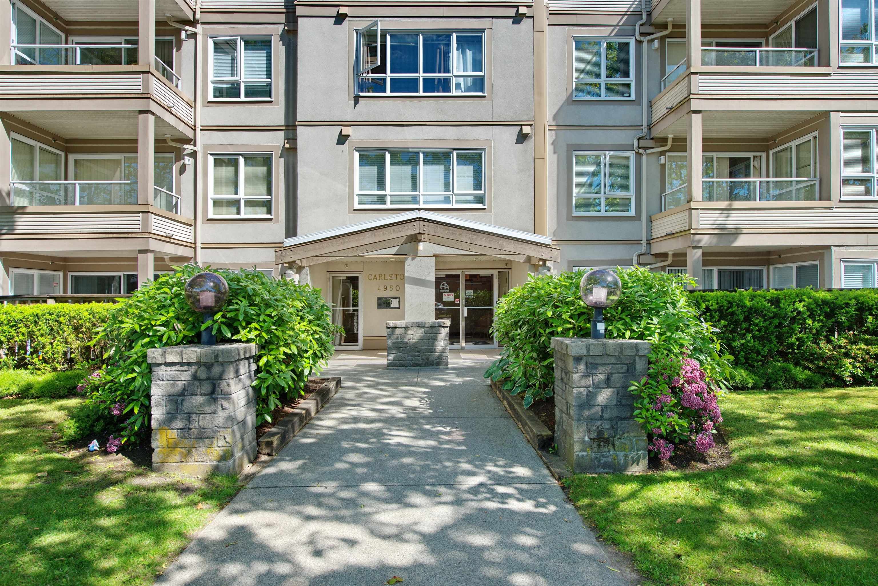 Main Photo: 205 4950 MCGEER Street in Vancouver: Collingwood VE Condo for sale (Vancouver East)  : MLS®# R2704047