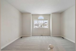 Photo 21: 10 Cougarstone Circle SW in Calgary: Cougar Ridge Detached for sale : MLS®# A2098810