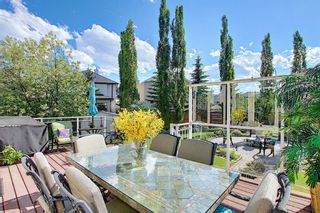 Photo 12: 31 Strathlea Common SW in Calgary: Strathcona Park Detached for sale : MLS®# A1147556