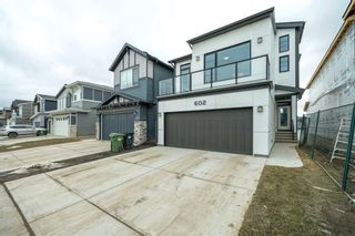 Photo 2: 602 Creekstone Circle SW in Calgary: C-168 Detached for sale : MLS®# A2119809
