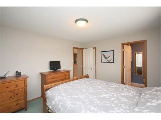 Photo 16: 197 QUIGLEY Drive: Cochrane House for sale : MLS®# C4015396